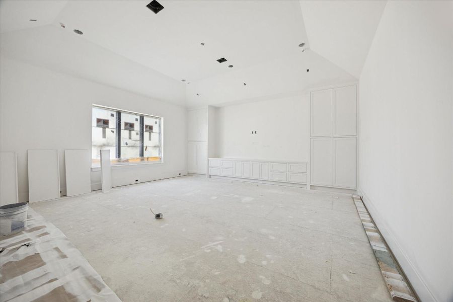 Spacious game room with custom cabinetry. Pictured February 2026.