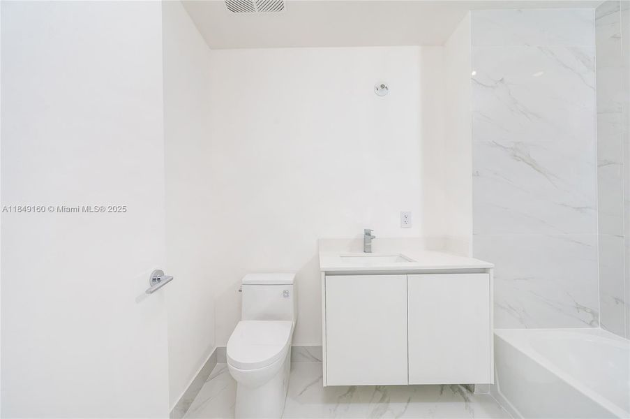 Furnished interior view inside a new home in Aria Reserve, Miami (Image 5).