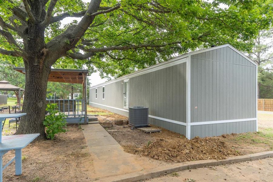 Exterior details and patio area of a home in , Gordonville (Image 12).