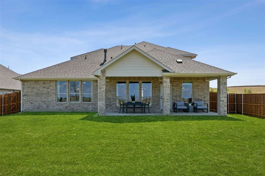 Front exterior of a new home in Stone Eagle, Azle, TX, highlighting curb appeal (Image 26). Front exterior of a new home in Stone Eagle, Azle, TX, highlighting curb appeal (Image 26).