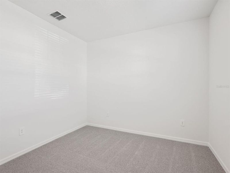 Spacious, unfurnished interior of a new home in Coasterra - Reserve Series, Palmetto (Image 19).