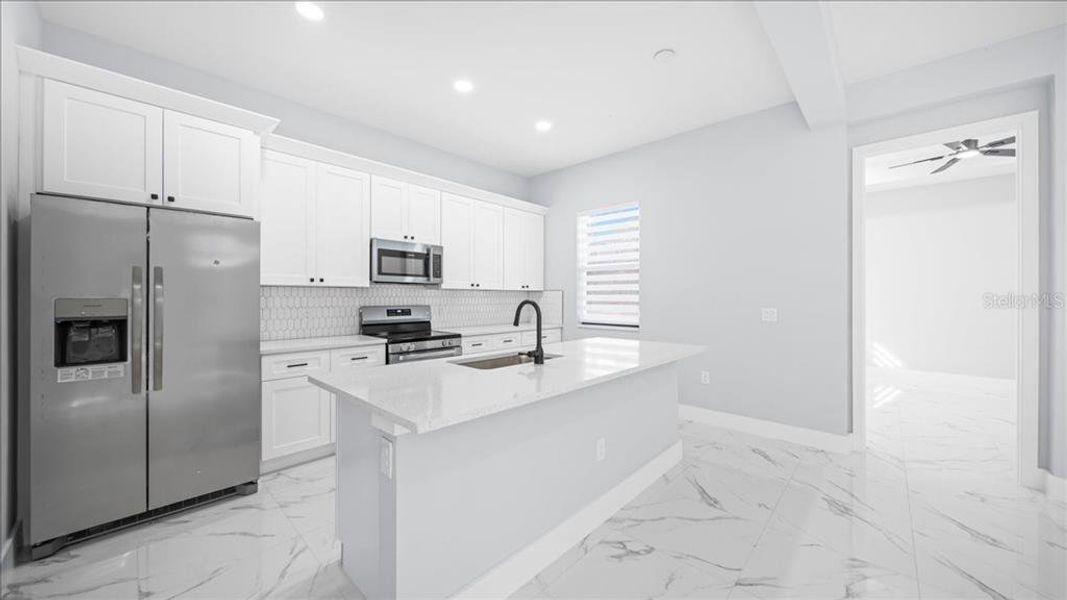 Furnished interior view inside a new home in , Lehigh Acres (Image 9).