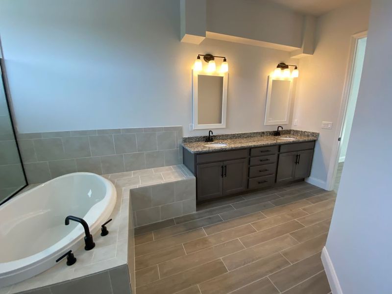 Representative furnished interior of a home built from the Avery by Paytas Homes in The Reserve at Victoria, Deland (Image 16).