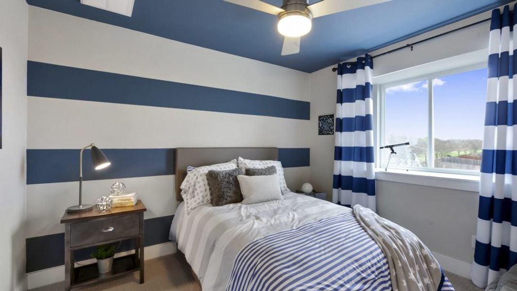 Representative furnished interior of a home built from the Houston by Pacesetter Homes in Village At Manor Commons, Manor (Image 18).