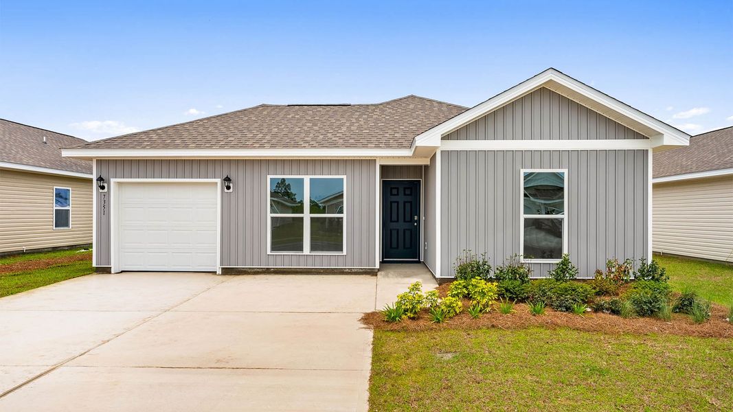 Front exterior of a new home in Liberty, Panama City, FL, highlighting curb appeal (Image 1). Front exterior of a new home in Liberty, Panama City, FL, highlighting curb appeal (Image 1).