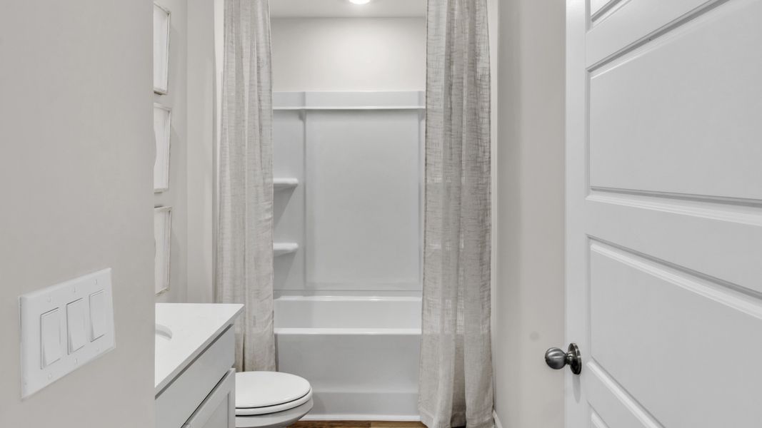 Representative furnished interior of a home built from the Freeport by D.R. Horton in Bailey Park, Fayetteville (Image 7).