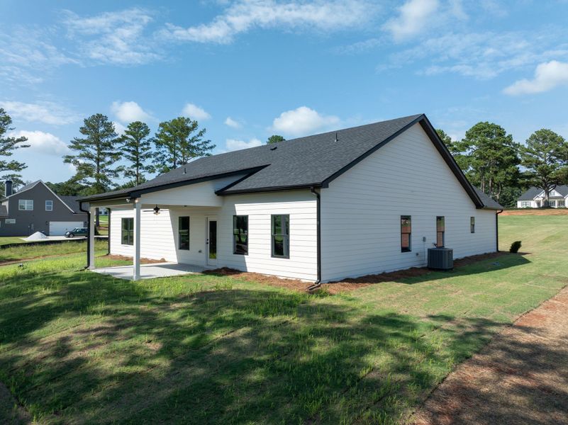 Front exterior of a new home in The Reserve at Reidsboro, Williamson, GA, highlighting curb appeal (Image 27).