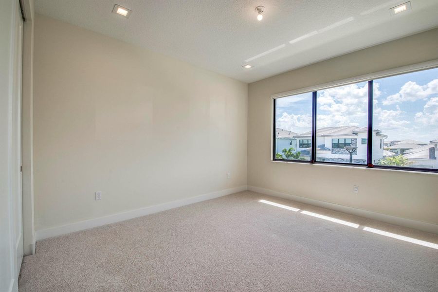 Furnished interior view inside a new home in Apex at Avenir, Palm Beach Gardens (Image 48).