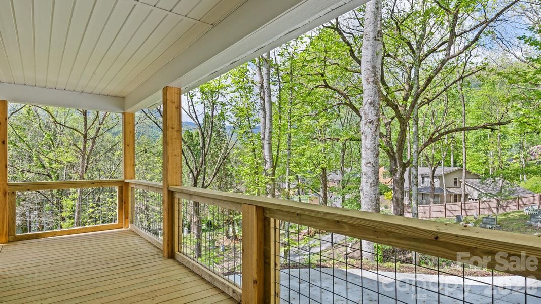 Exterior details and patio area of a home in , Maggie Valley (Image 24).