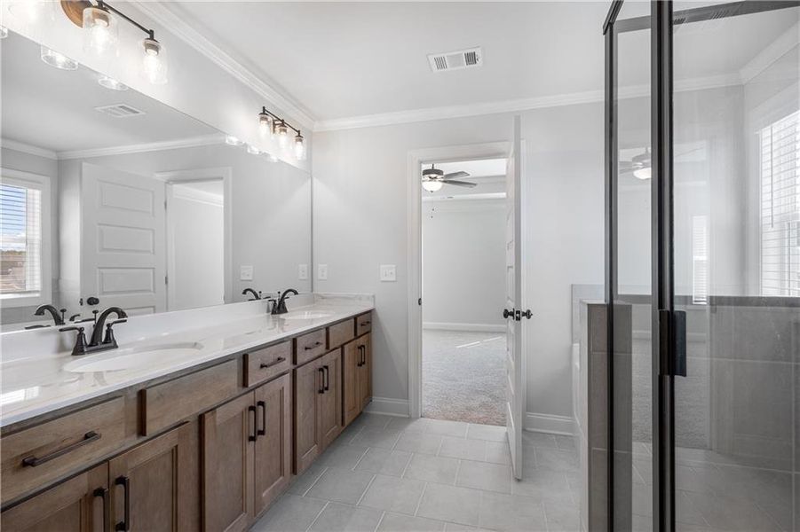 Furnished interior view inside a new home in Calgary Downs, Winder (Image 10).