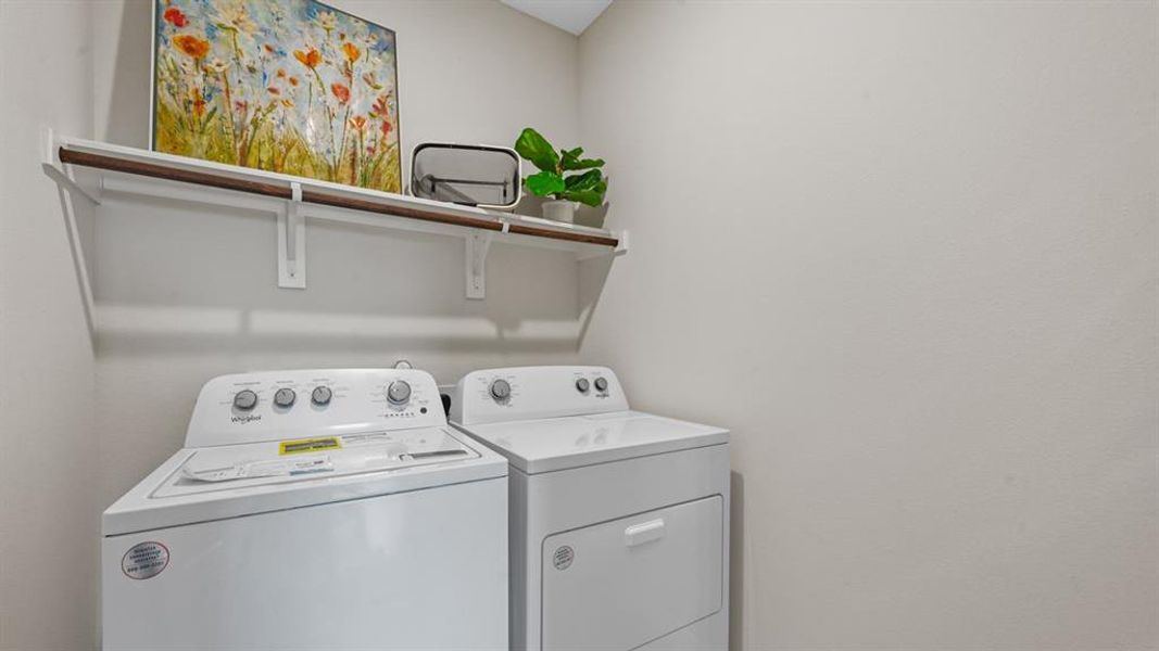 Laundry area featuring independent washer and dryer Laundry area featuring independent washer and dryer