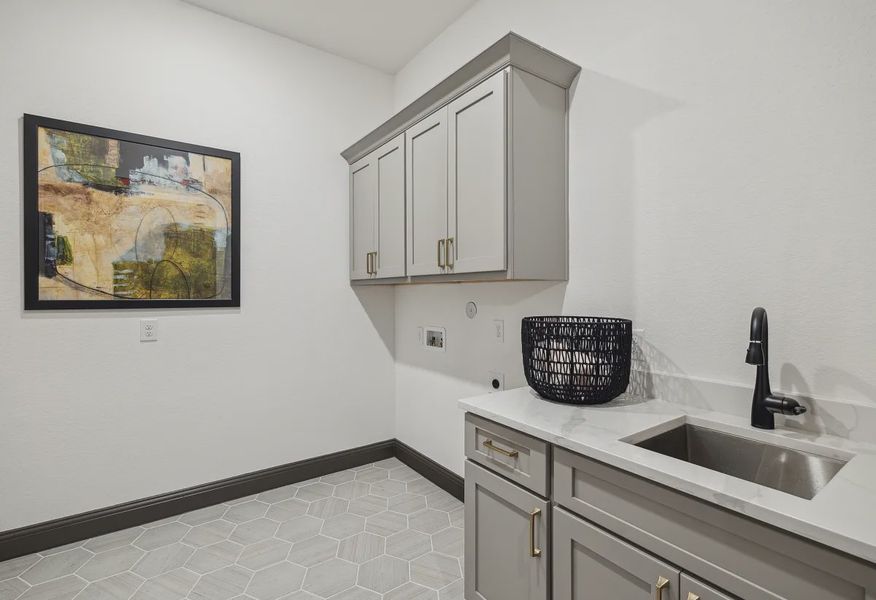 Plan 5042 laundry room - staged - 13 of 21 Plan 5042 laundry room - staged - 13 of 21