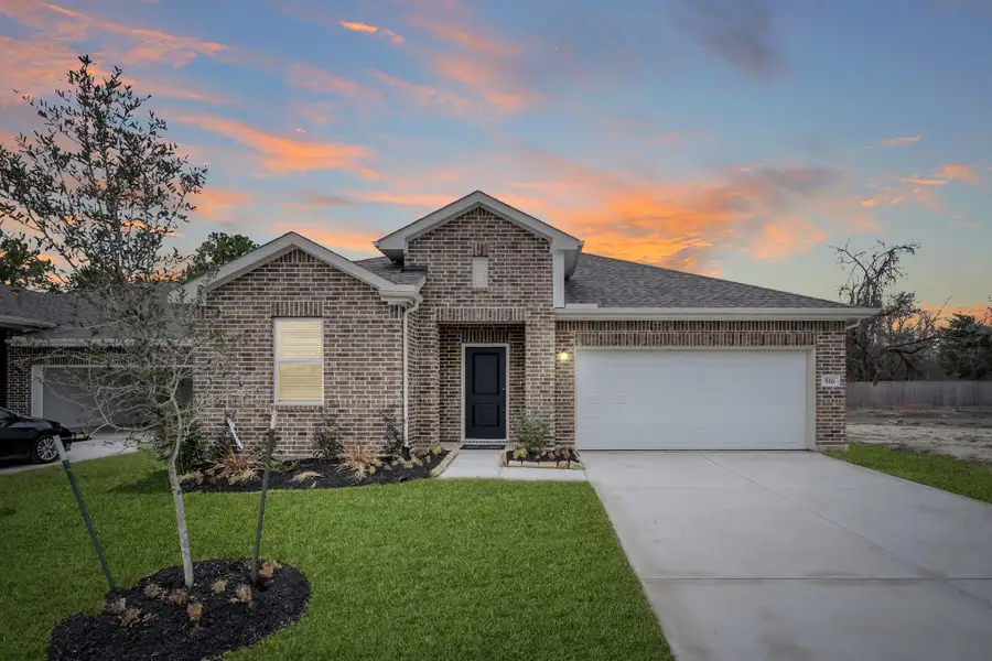 Front exterior of a new home in Aspire at The Reserve at Huntsville, Huntsville, TX, highlighting curb appeal (Image 2). Front exterior of a new home in Aspire at The Reserve at Huntsville, Huntsville, TX, highlighting curb appeal (Image 2).