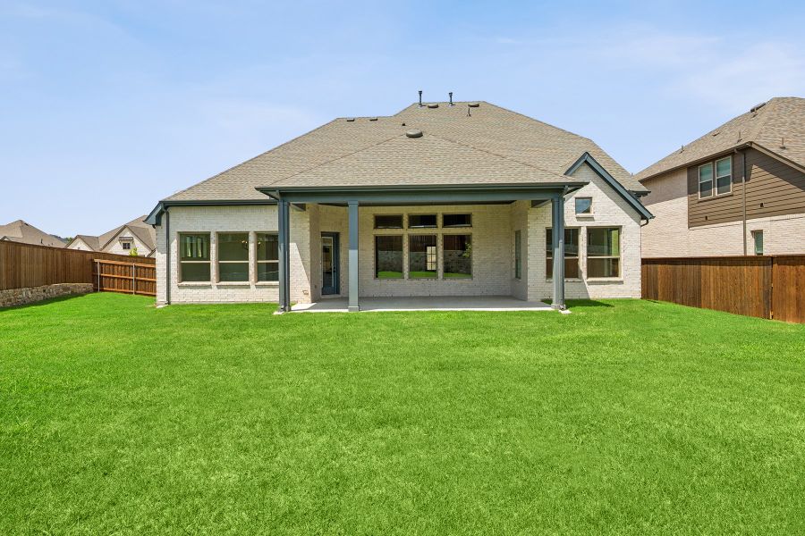 Representative exterior details of a home built from the The Owen by David Weekley Homes in Monterra - Classics, Fate (Image 4).
