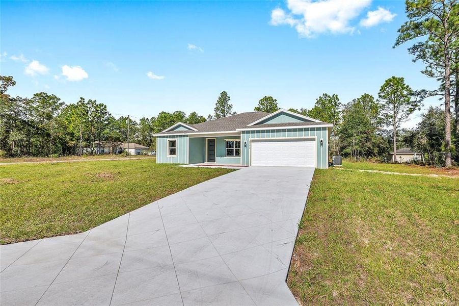 Front exterior of a new home in , Citrus Springs, FL, highlighting curb appeal (Image 22).