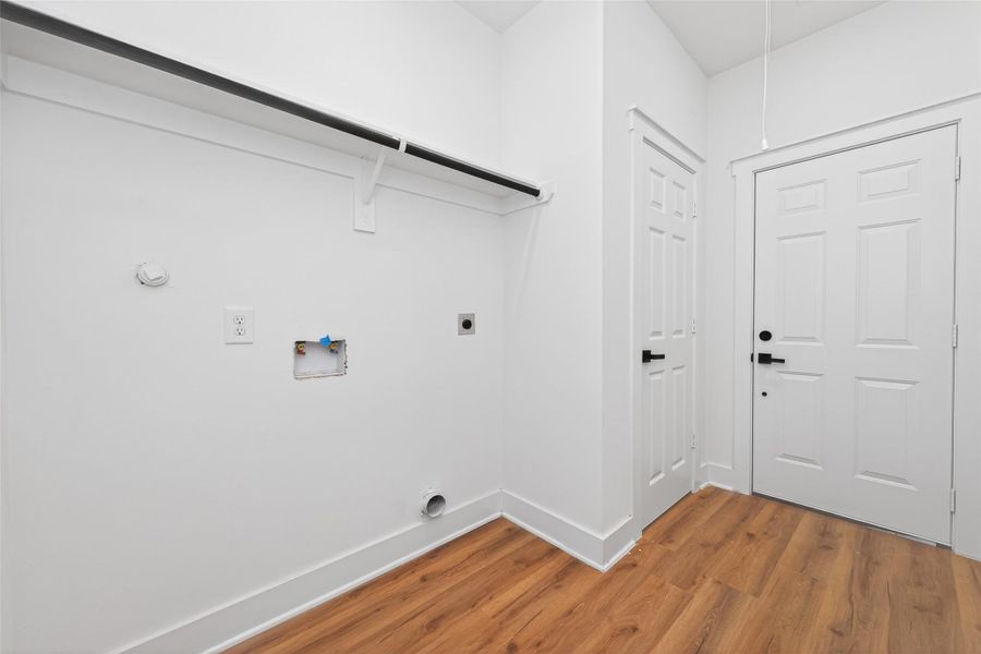 Dedicated laundry area with convenient access and functionality.