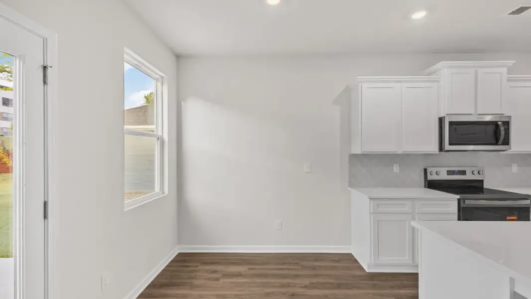 Representative furnished interior of a home built from the Ansley by D.R. Horton in Walden Ridge, Macon (Image 9).