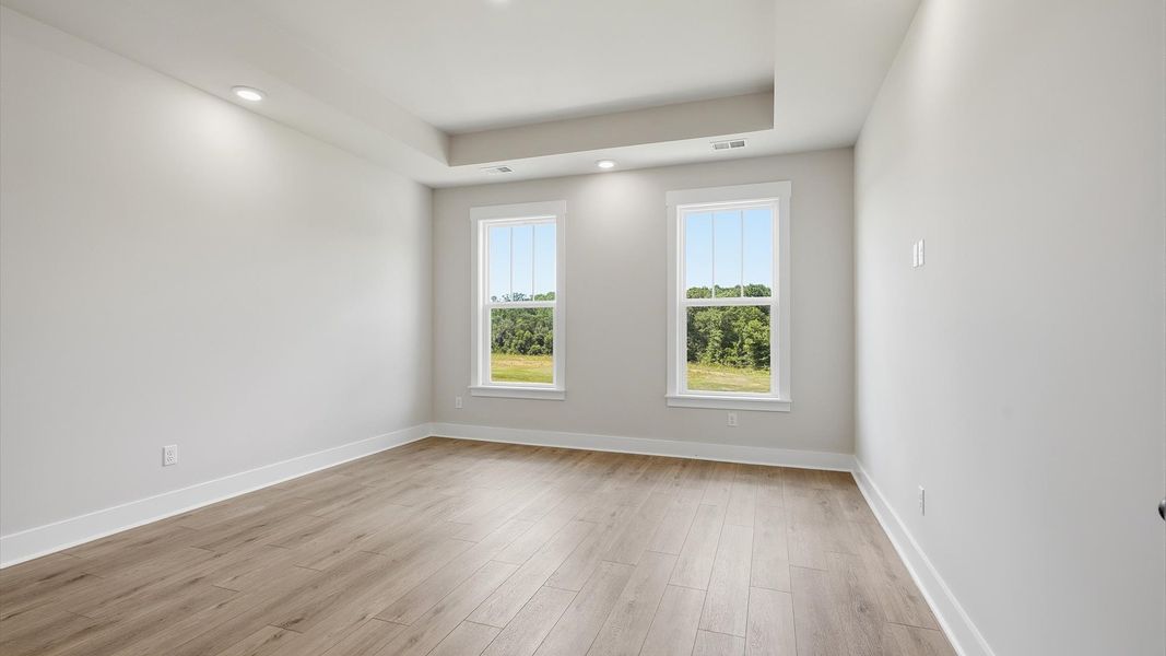 Desirable primary suite layout with spacious en suite bath in a proven, established community in Woodruff, SC