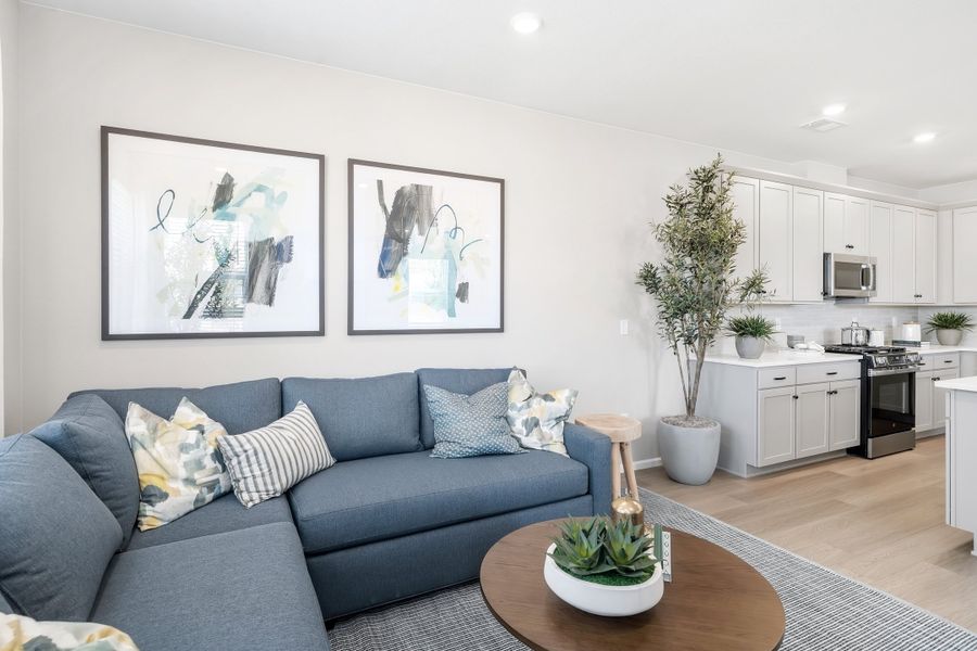 Representative furnished interior of a home built from the 2403 by Risewell Homes in Harvest Crossing, Aurora (Image 11).