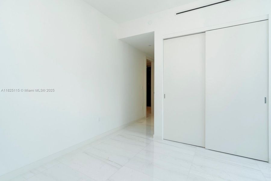 Spacious, unfurnished interior of a new home in Aston Martin Residences, Miami (Image 19).