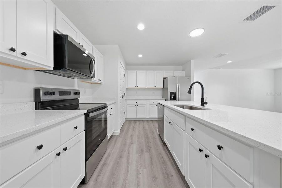 Furnished interior view inside a new home in , Dunnellon (Image 12).