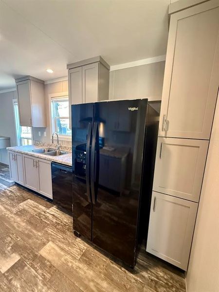 Furnished interior view inside a new home in , Pelican Bay (Image 8).