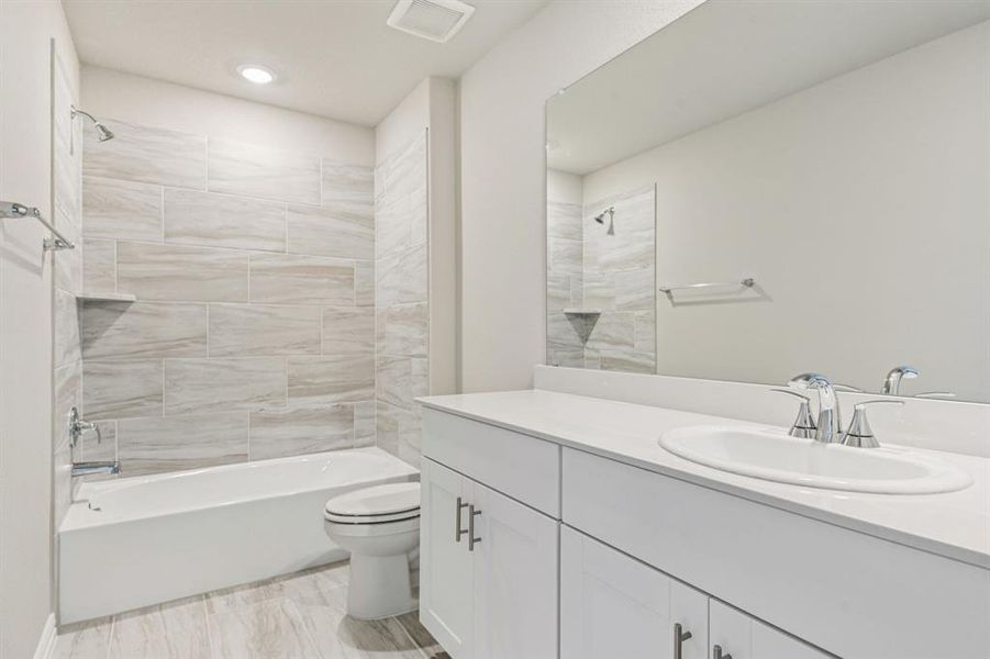 Photo is not of the actual home, but is an inspirational photo of builder’s model home and may depict options, furnishings, and/or decorator features that are not included.