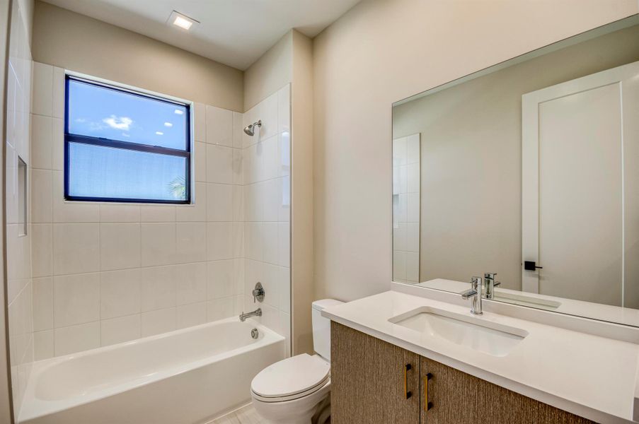 Furnished interior view inside a new home in Apex at Avenir, Palm Beach Gardens (Image 10).