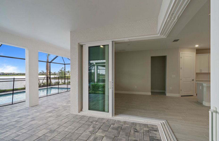 Exterior details and patio area of a home in Del Webb Oak Creek, North Fort Myers (Image 21).