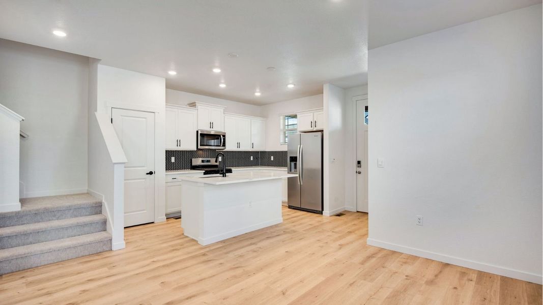 Furnished interior view inside a new home in Horizon Uptown, Aurora (Image 7).