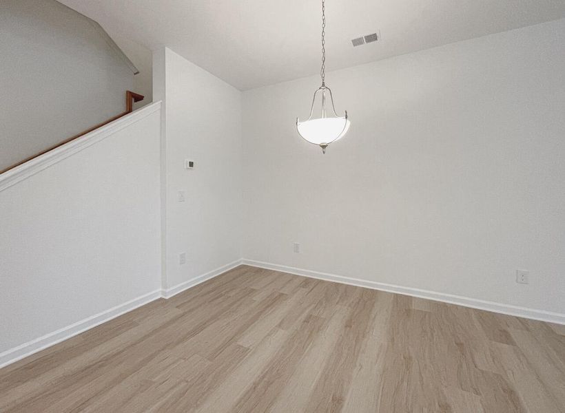 Spacious, unfurnished interior of a new home in East Main Townes, Spartanburg (Image 13).