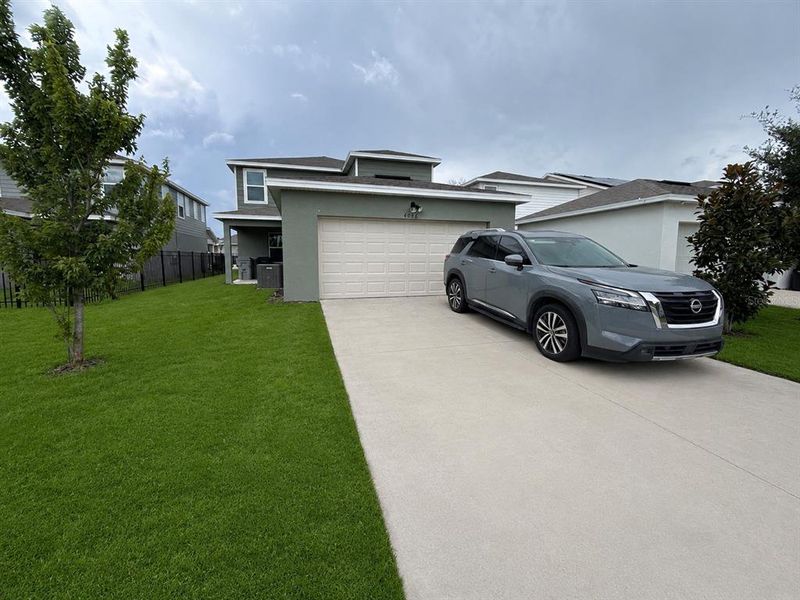 Exterior details and patio area of a home in Winding Meadows, Apopka (Image 30).