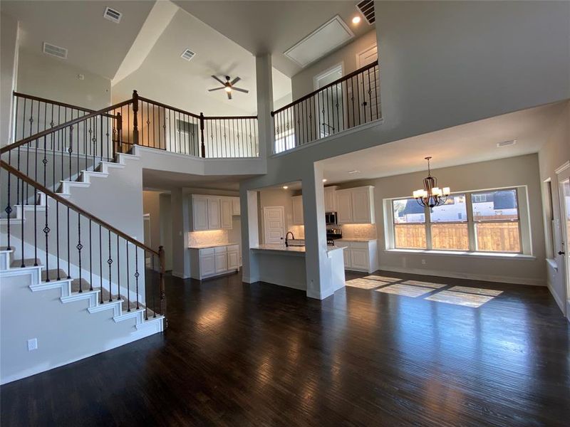 Open & impressive layout with elegant wrought iron spindled staircase