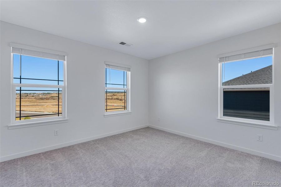 Spacious, unfurnished interior of a new home in Trails at Crowfoot, Parker (Image 22).