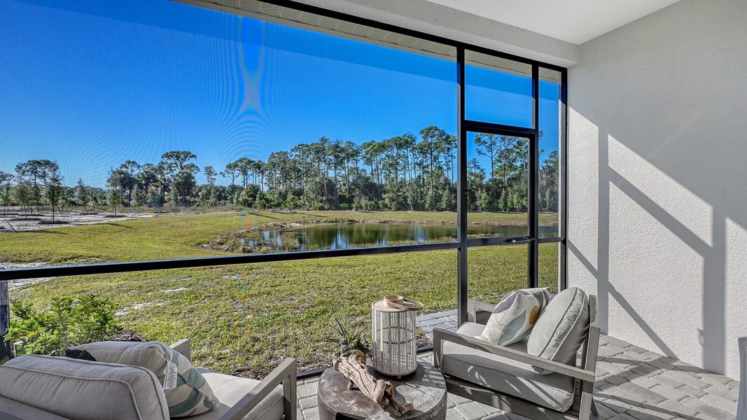 Exterior details and patio area of a home in SkySail, Naples (Image 4).