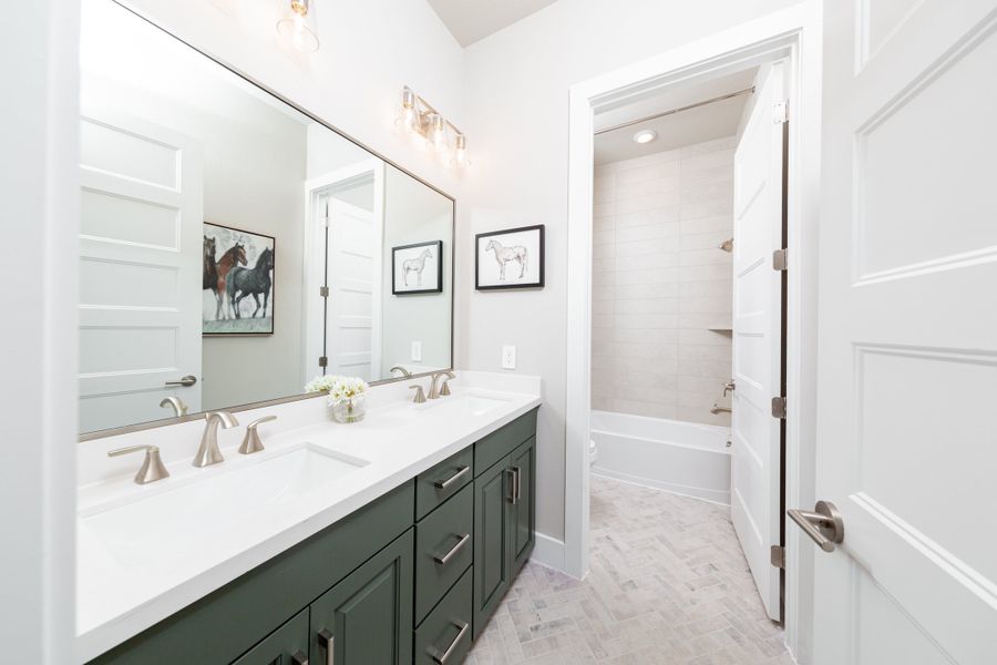 Furnished interior view inside a new home in Ellwood: Prestige Collection, Iowa Colony (Image 4).