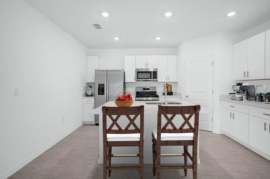 Furnished interior view inside a new home in Waterstone, Groveland (Image 4). Furnished interior view inside a new home in Waterstone, Groveland (Image 4).