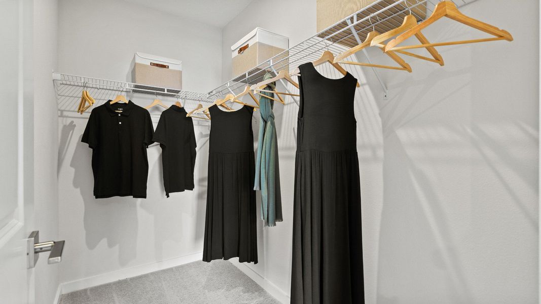 The Atlantic Model by DRB Homes Primary Suite walk-in closet located in Winter Haven, FL The Atlantic Model by DRB Homes Primary Suite walk-in closet located in Winter Haven, FL