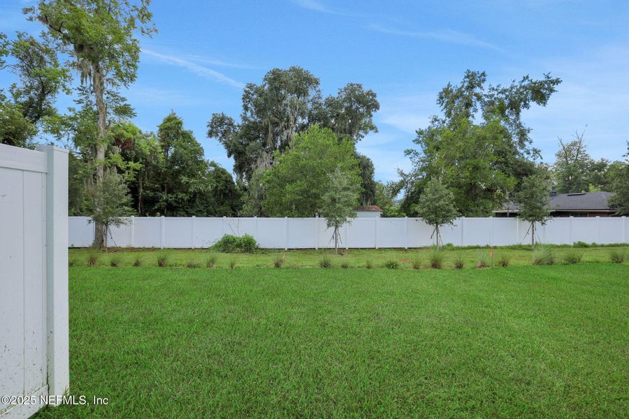 Front exterior of a new home in Kasen Oaks, Jacksonville, FL, highlighting curb appeal (Image 19).