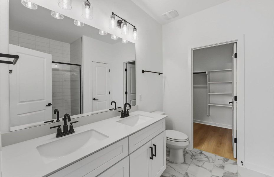 Furnished interior view inside a new home in Sunfield, Buda (Image 9).