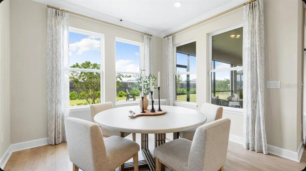 Furnished interior view inside a new home in Coasterra Community Group Page, Palmetto (Image 18).