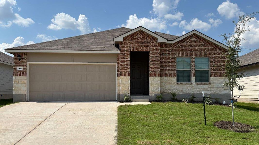 Front exterior of a new home in Pecan Creek, Temple, TX, highlighting curb appeal (Image 1). Front exterior of a new home in Pecan Creek, Temple, TX, highlighting curb appeal (Image 1).