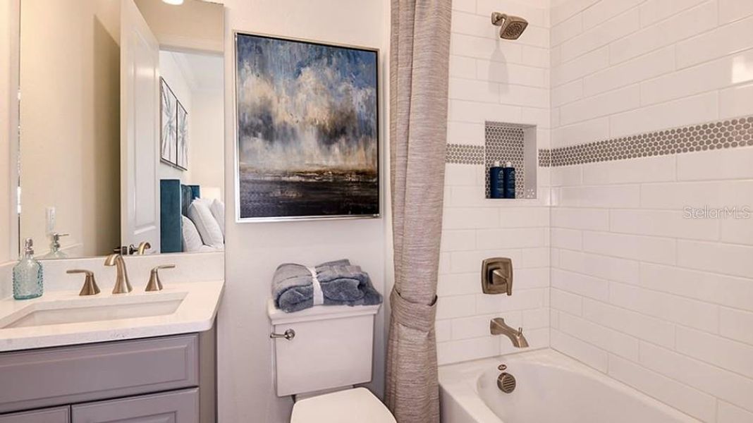 Furnished interior view inside a new home in Esplanade at Azario Lakewood Ranch, Lakewood Ranch (Image 13).