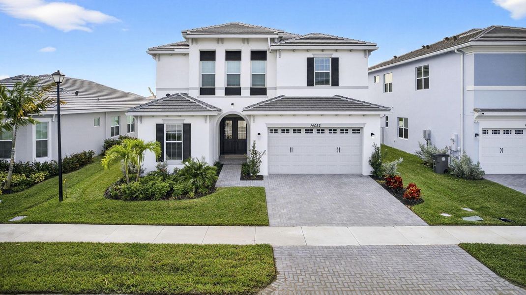 Front exterior of a new home in , Westlake, FL, highlighting curb appeal (Image 28).