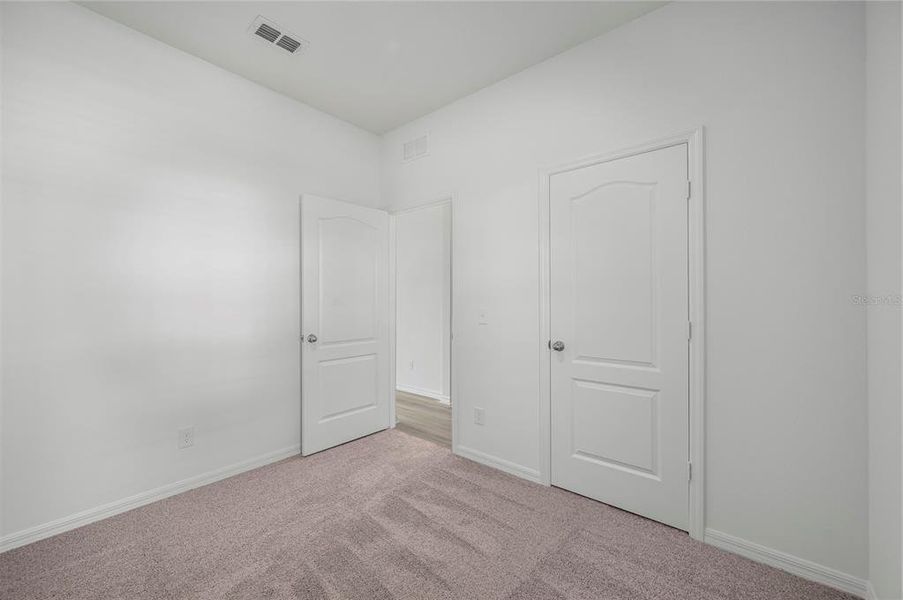 Spacious, unfurnished interior of a new home in Gum Lake Preserve, Lake Alfred (Image 8). Spacious, unfurnished interior of a new home in Gum Lake Preserve, Lake Alfred (Image 8).