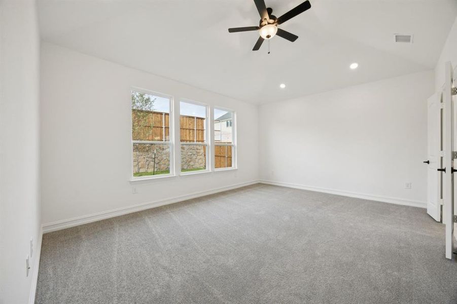 Spacious owner's suite with private bath. *Model representation.
