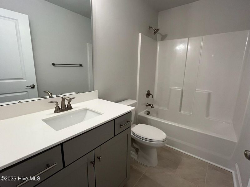 Furnished interior view inside a new home in Palmetto Creek, Bolivia (Image 16).