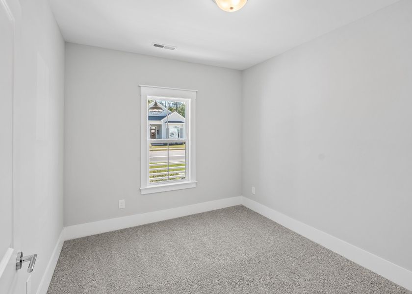 Representative unfurnished interior of a home built from the Birchwood by Bill Clark Homes in Osprey Landing, Southport (Image 27).