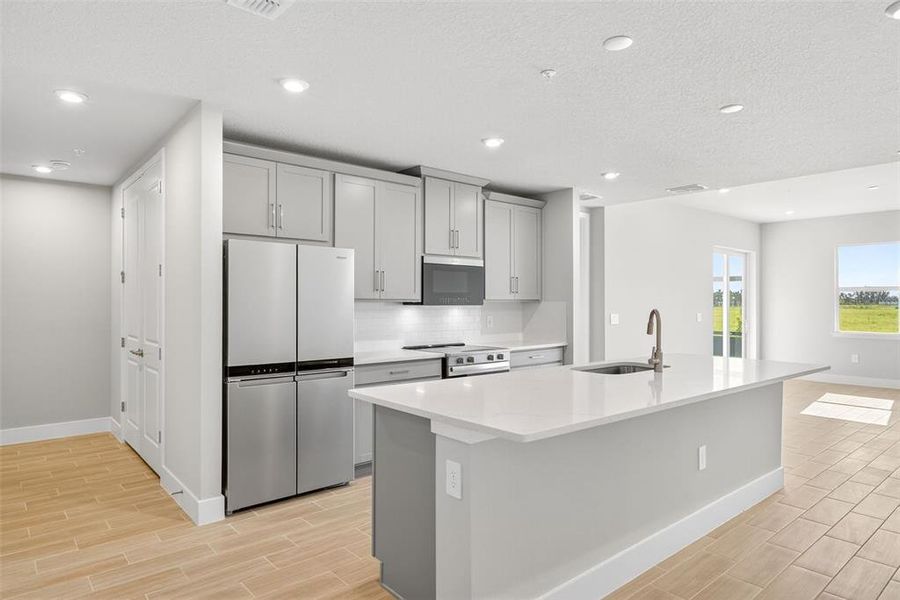 Furnished interior view inside a new home in Wellen Park, Venice (Image 5).