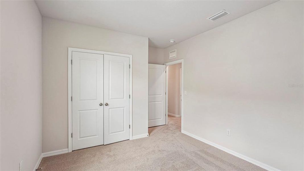 Spacious, unfurnished interior of a new home in Legacy Preserve, Parrish (Image 25). Spacious, unfurnished interior of a new home in Legacy Preserve, Parrish (Image 25).